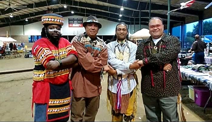 Standing together in regalia